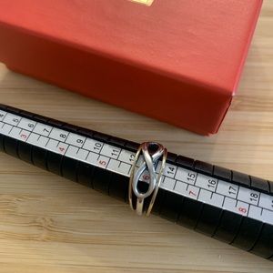Beautiful James Avery Small infinity ring with added 14k gold bands EUC
